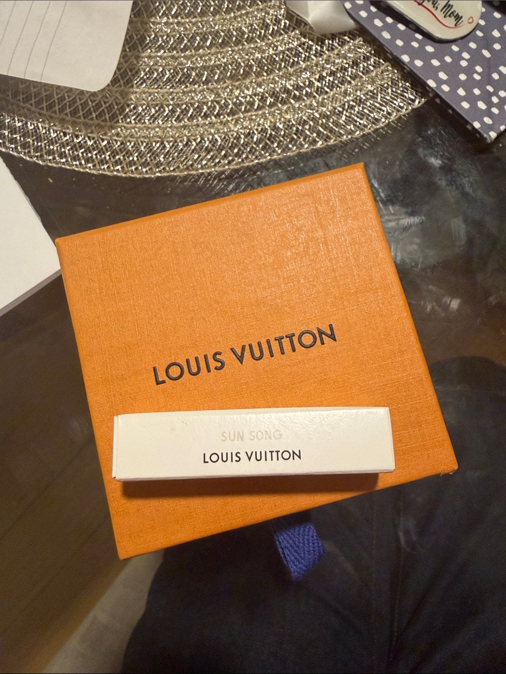 Louis Vuitton Orange Box with White Sun Song sample
